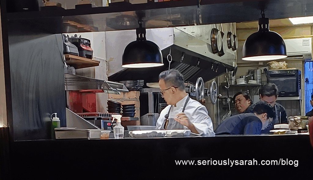 Chef Imran working with other chefs in kitchen