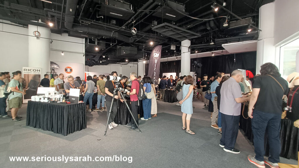 Convention hall of sg camera con filled with people